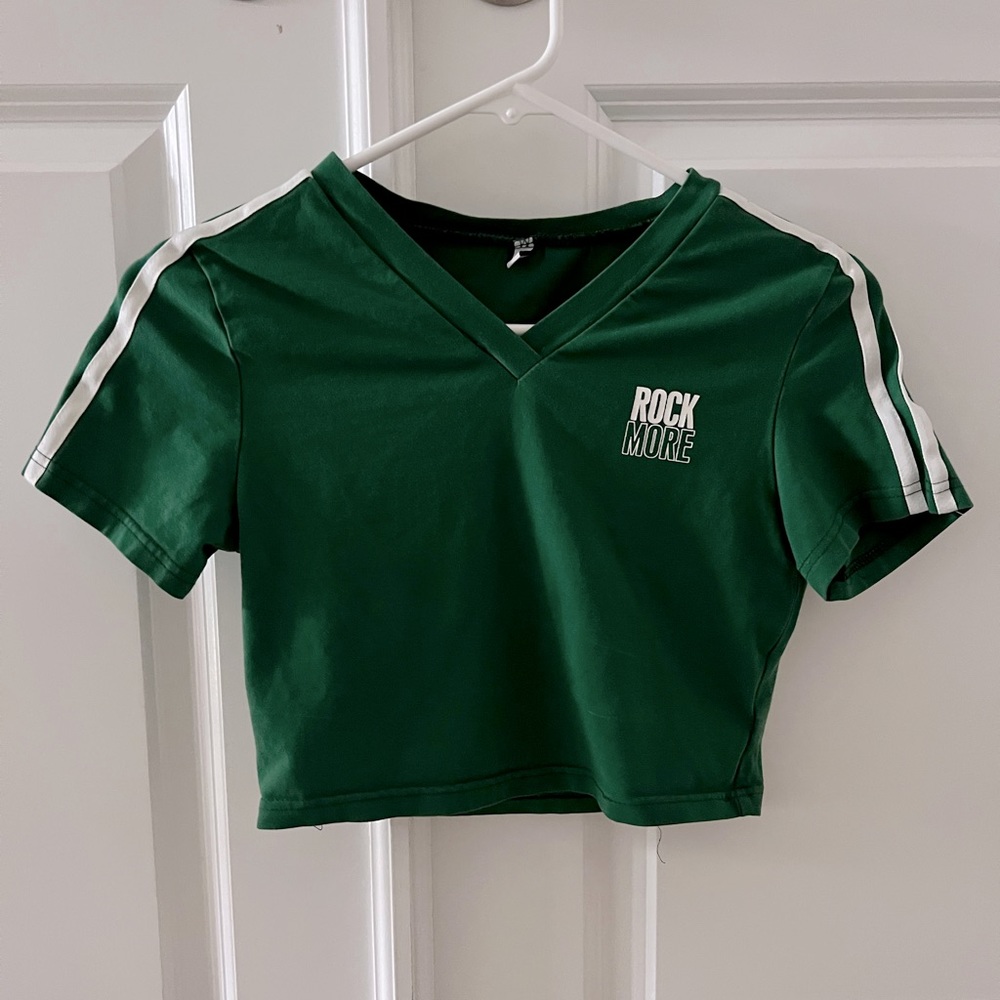 Green cropped V-neck.